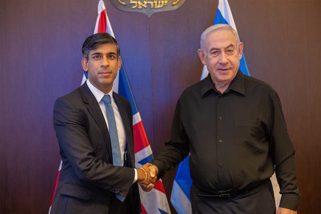<p>Shoulder to shoulder: Rishi Sunak with Benjamin Netanyahu  </p>